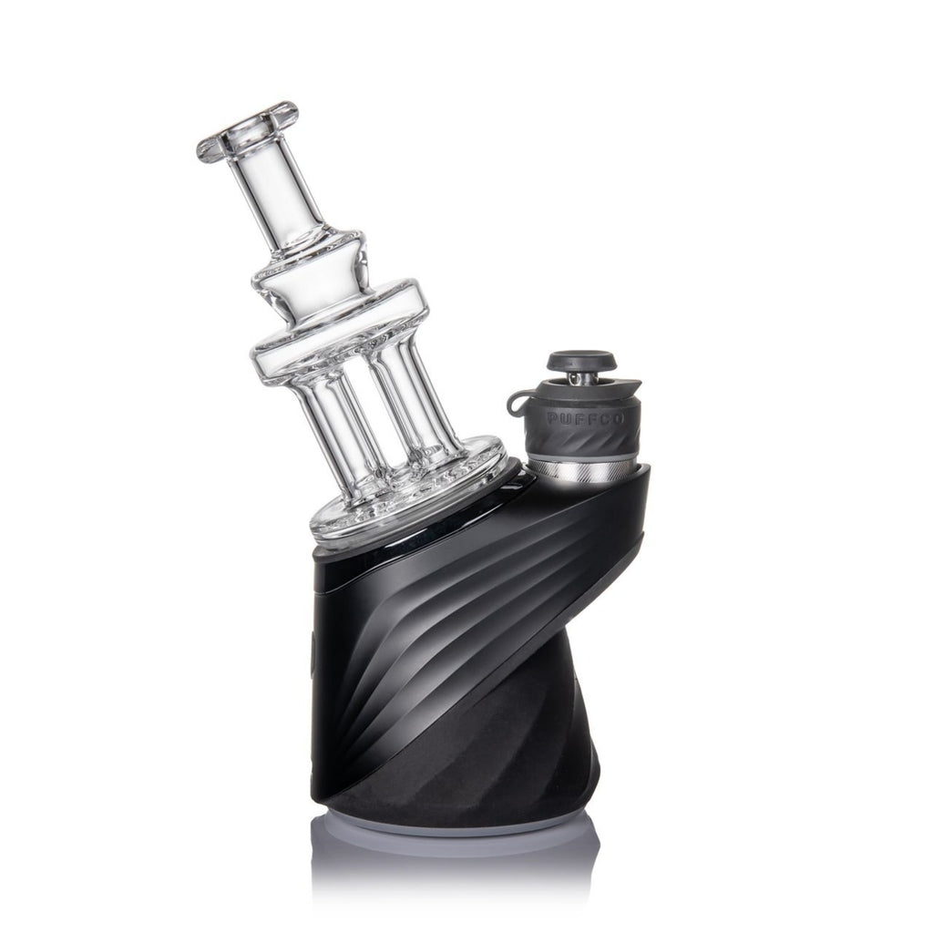 MJ Arsenal Quadra Puffco Peak Top, featuring a clear borosilicate glass top with a black silicone base and a sleek four-post design.